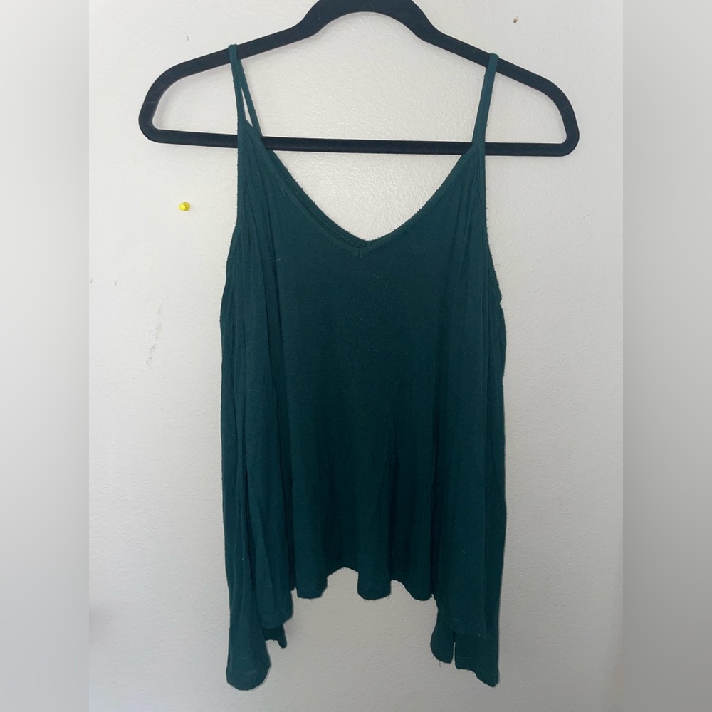 Green women’s flared long sleeve shirt with cut out shoulders